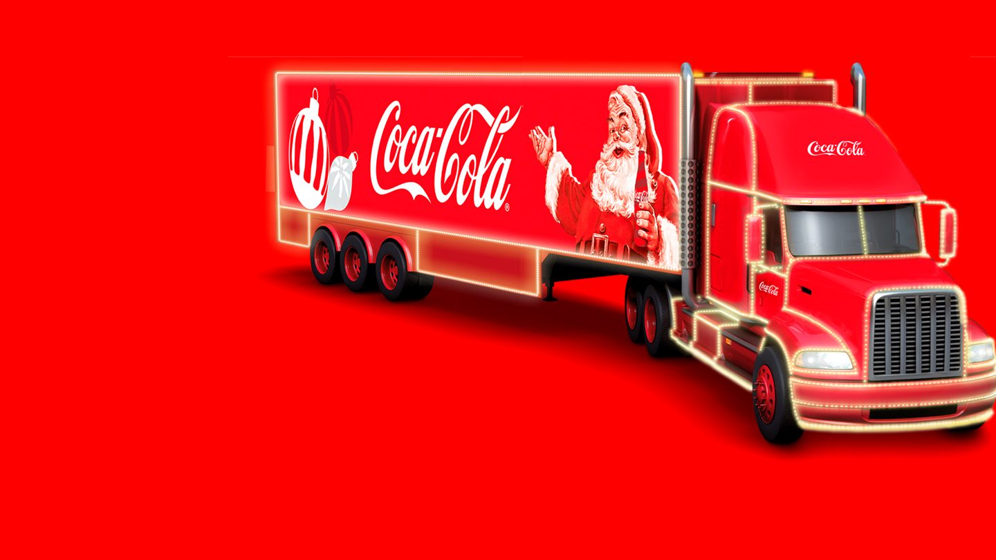 Banner com fundo vermelho. Tem um caminhão da Coca-Cola com uma foto do Papai Noel e enfeites de Natal.