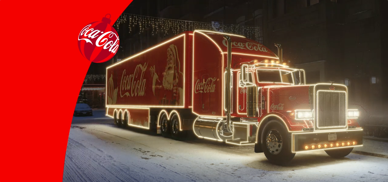 The Coca-Cola holiday caravan truck adorned with lights and ornaments