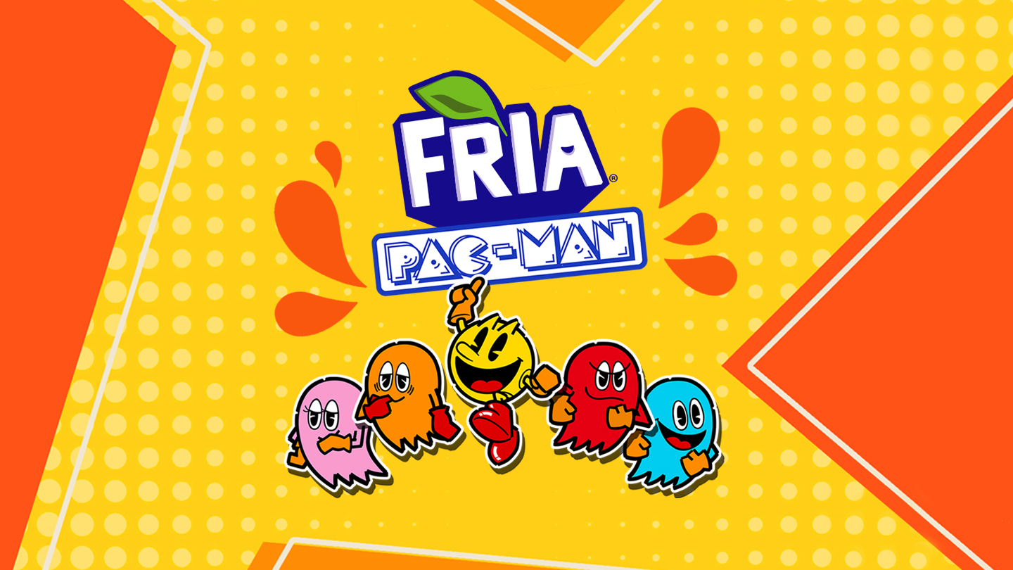  Logo de Tropical con fondo naranja y amarillo y Pac-Man saltando alegremente en el centro, junto con los fantasmas de colores a los lados.