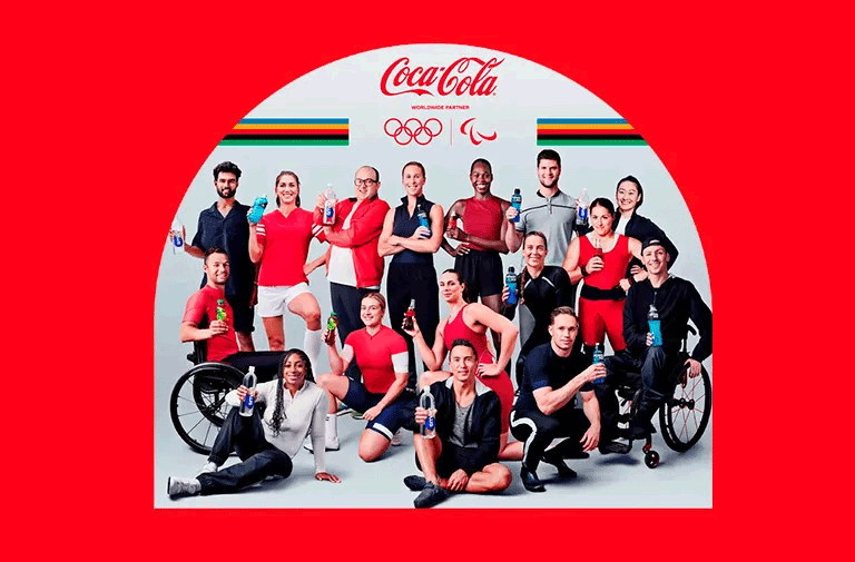 Group of Olympic and Paralympic athletes holding different Coca-Cola products