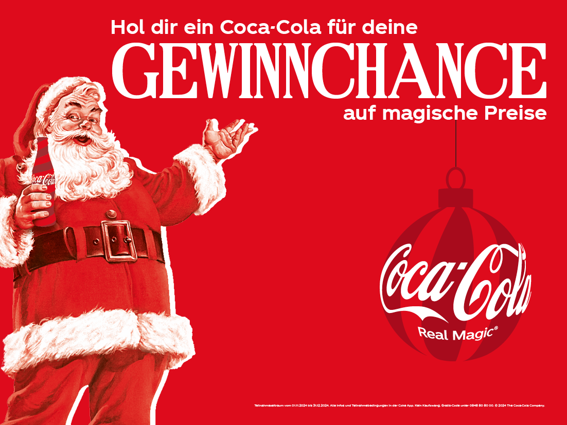 Santa Clause drinking a bottle of Coca-Cola