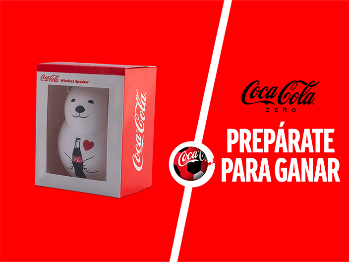 Fotografía del packaging de un paralnte con forma de oso polar sobre un fondo rojo. A la derecha el logo de "Coca-Cola Zero" y debajo la frase "Prepárate para ganar"