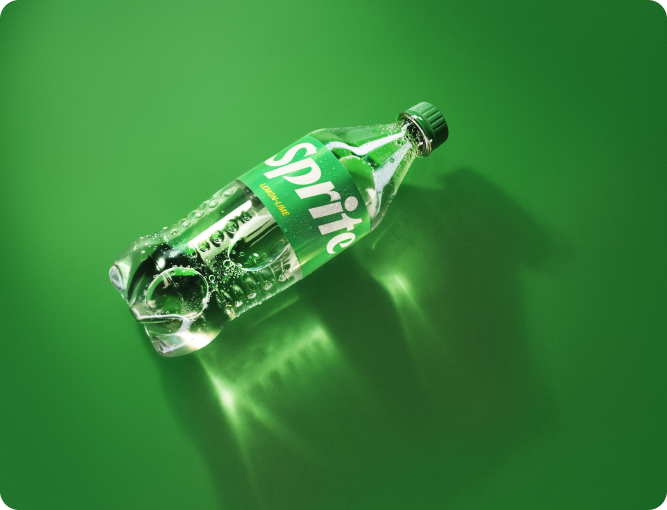 Sprite bottle on green background
