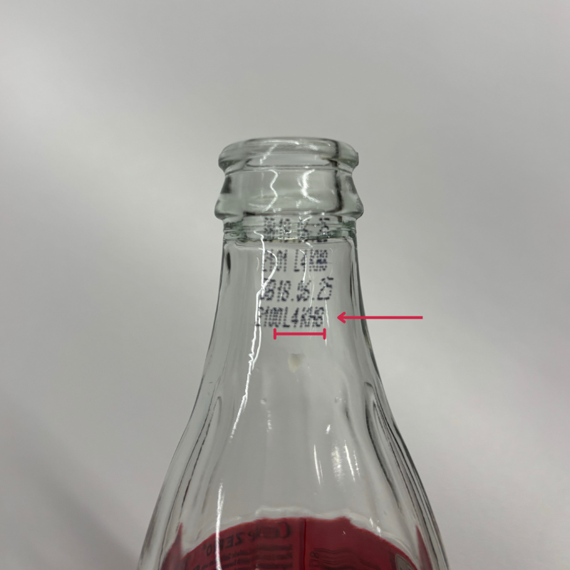 coca-cola glass bottle showing where batchcode are