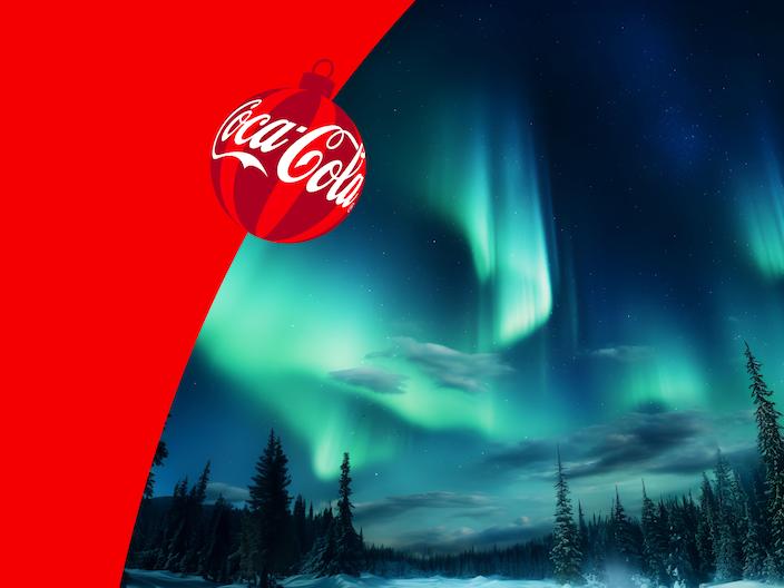 coca-cola ornament overlaying aurora borealis