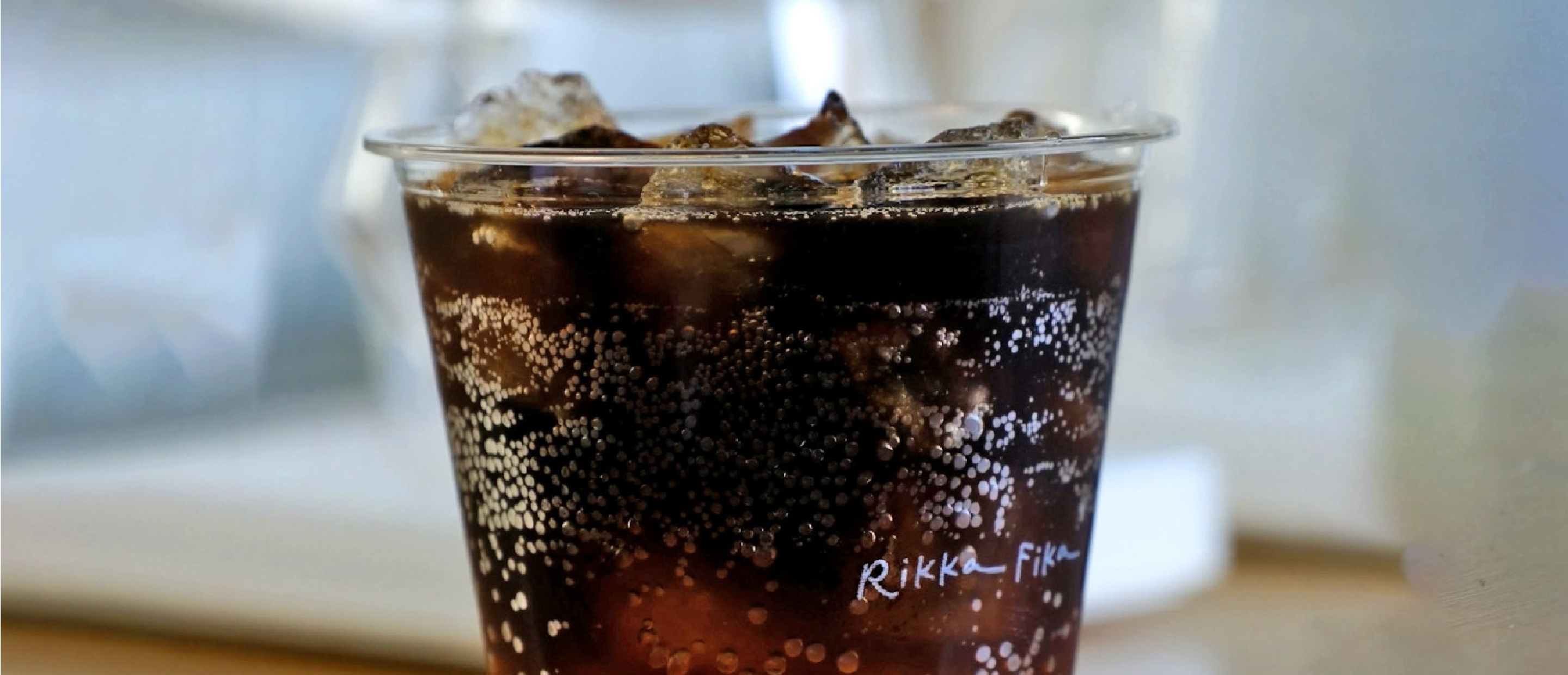 Cold brew yuzu fizz in a glass with ice