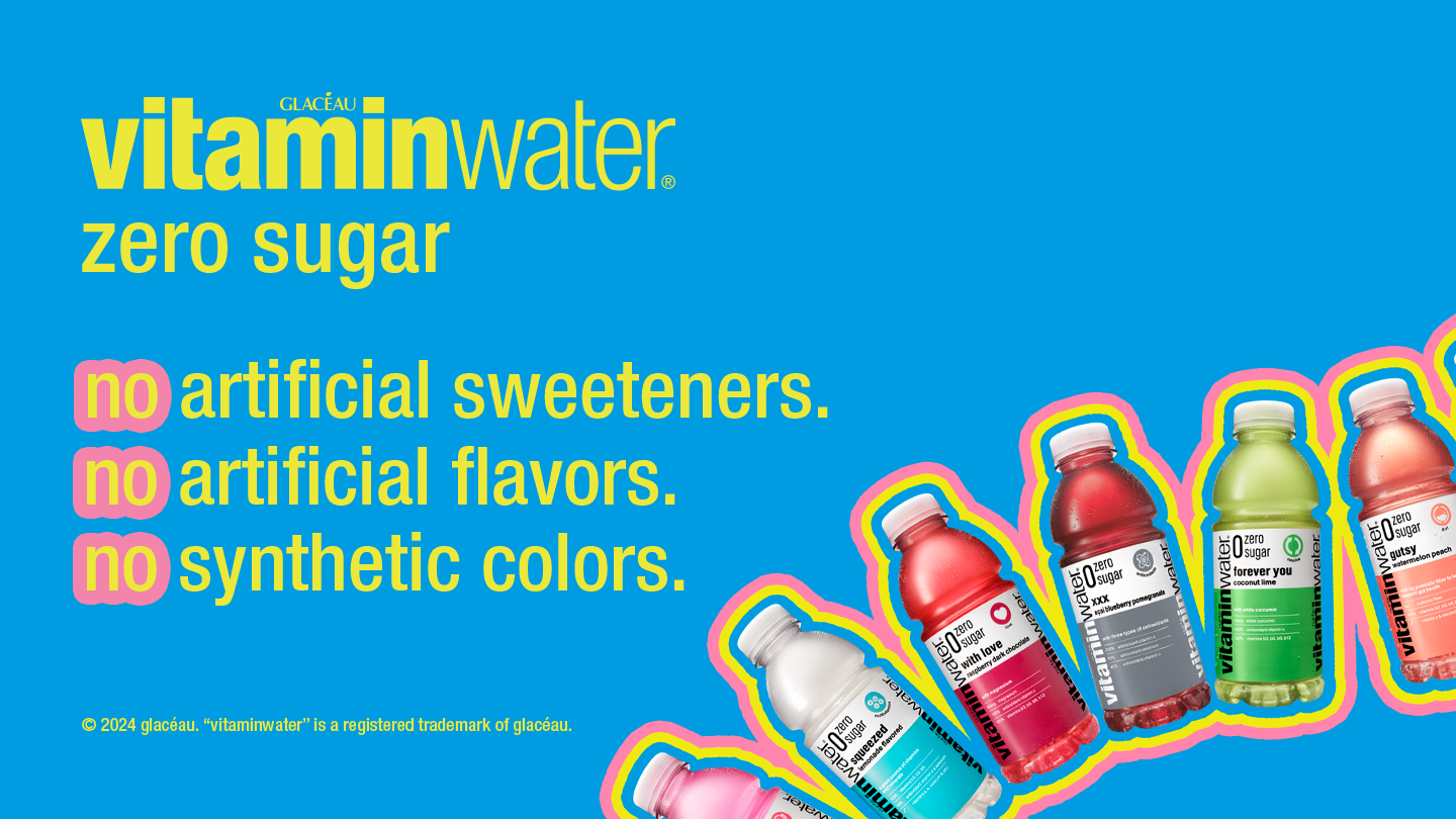 Various Vitaminwater Zero Sugar bottles arranged in a curve on a blue blackgroun, with the phrase 'Vitaminwater Zero Sugar all new taste, zero missing out.' displayed on the left