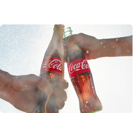 two coke bottles cheers!