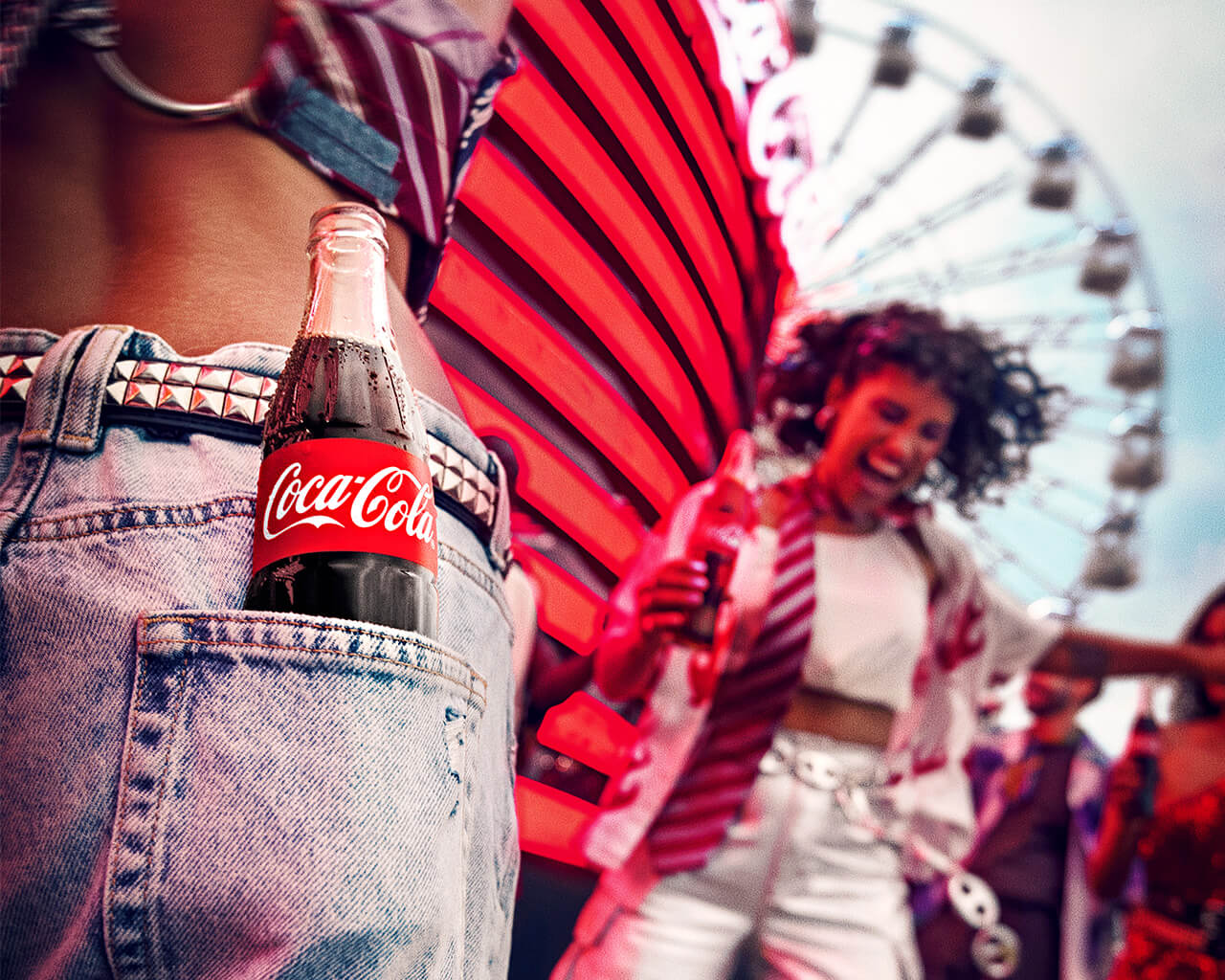 Festival fans celebrating with Coke